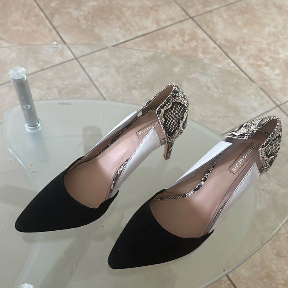 Antonio Melani never worn